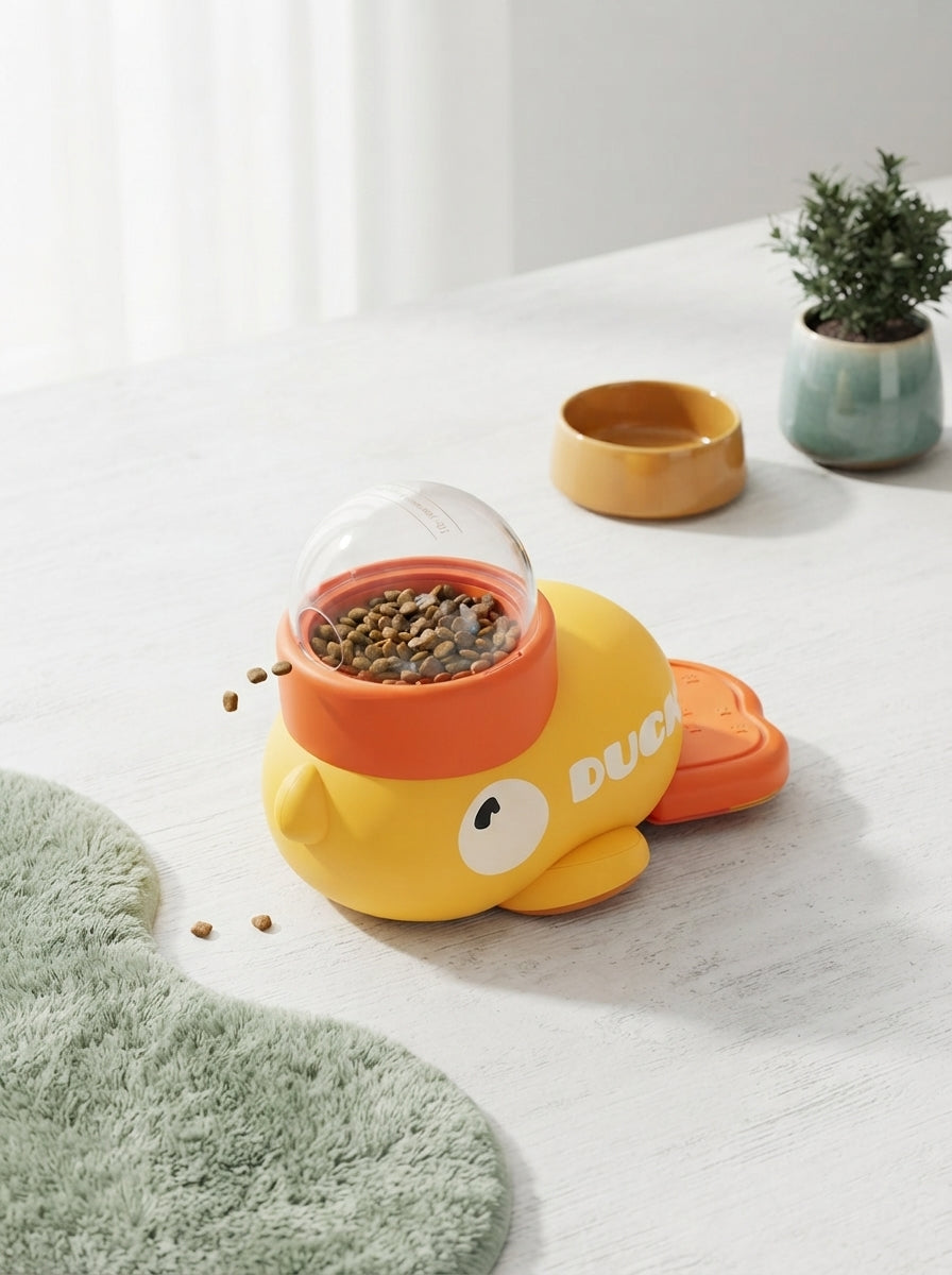 Automatic Interactive Pet Treat Dispenser sitting on a modern surface with sage green and warm amber decorative accents.